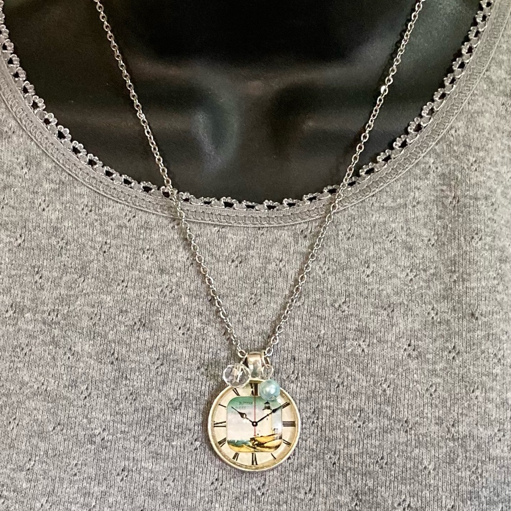 Lighthouse pendant with charms